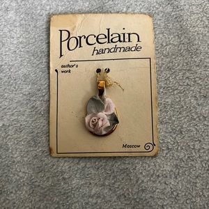 Porcelain handmade pendant with light pink rose made in moscow